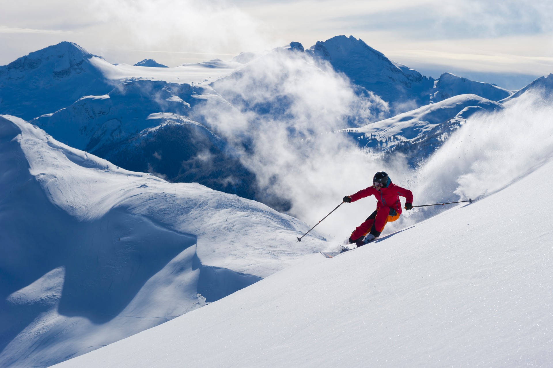 Woman skis fresh powder snow