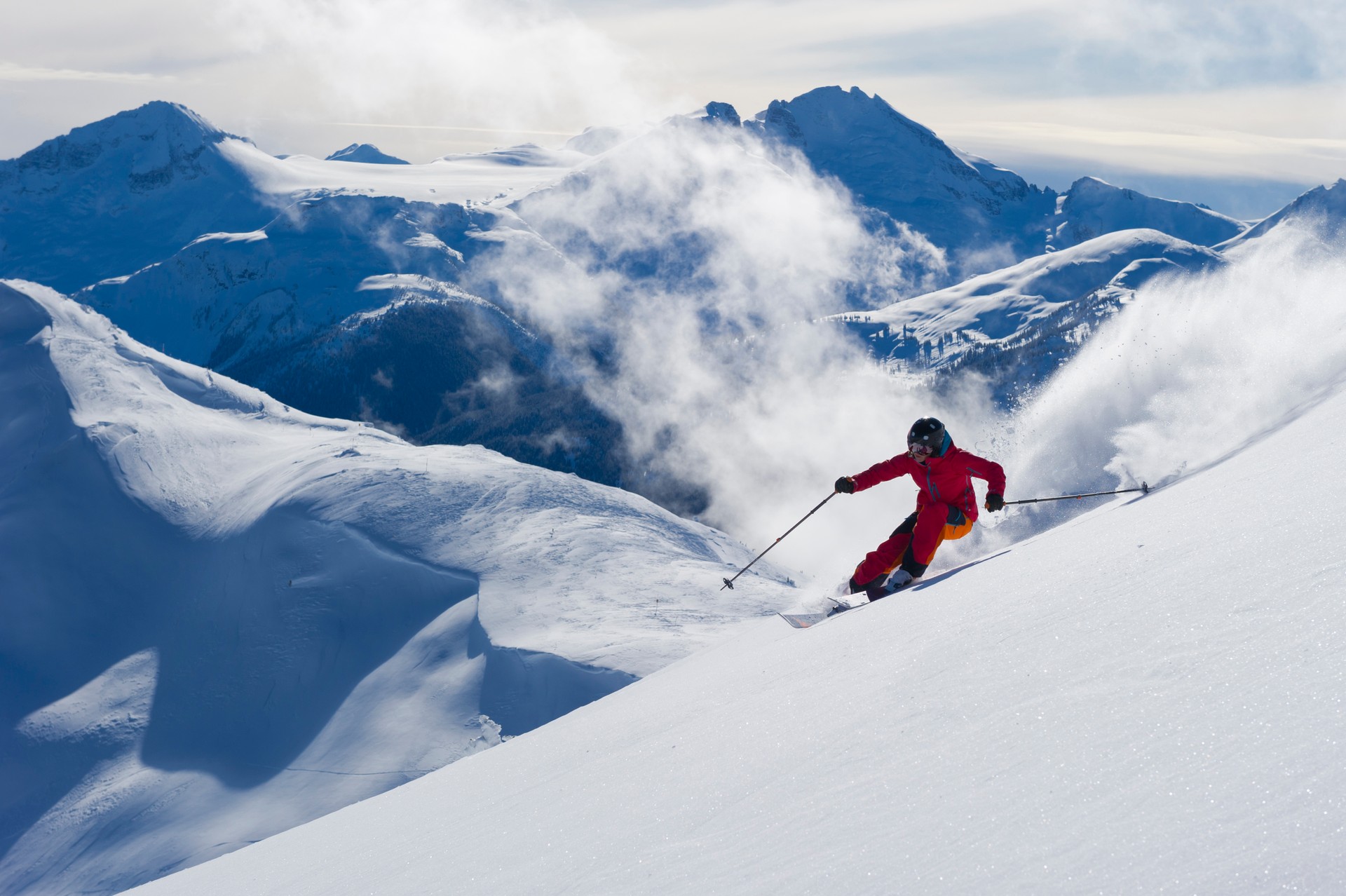 Woman skis fresh powder snow